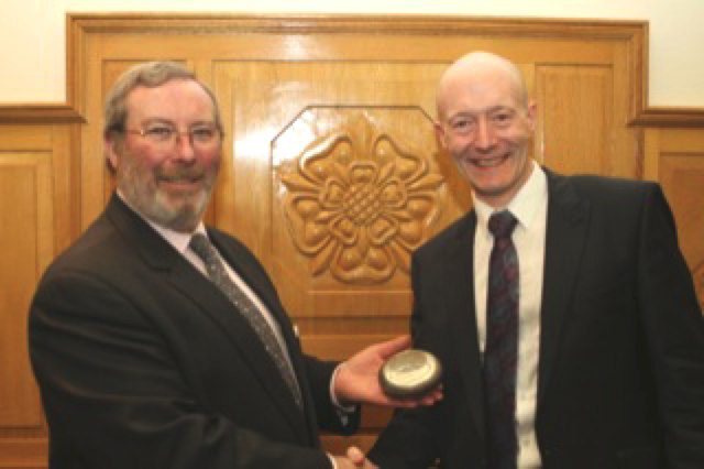 chris heaton right presents christopher jewitt with a bowl made by suzi horan to commemorate his 6 years service as chairman of sheffield assay office